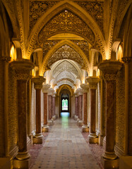 Obraz premium Ornate Architectural Corridor with Arches and Historic Interior Symmetry