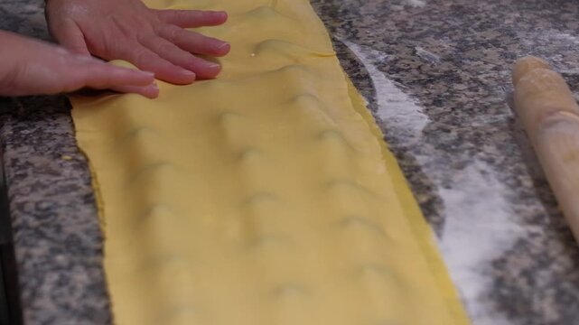 Hands Sculpting Italian Pasta With Flour, Skilled Chef Making Homemade Italian Pasta Using Fresh Ingredients, Preparing Traditional Italian Pasta Ravioli In Kitchen, Authentic Cooking Process