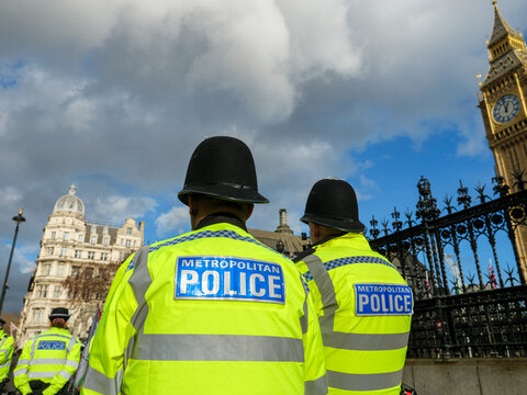 London, UK - January 28, 2026: Metropolitan Police officers patrolling outside Big Ben and the Houses of Parliament