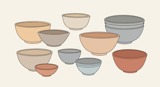 Set of various sized empty ceramic bowls in neutral colors.