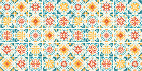 Seamless Mexican tiles pattern with green, orange, and yellow floral diamond motifs in a Talavera style. Bright geometric repeating background for wallpaper, fabric, wrapping paper, and decor. © Danchenko