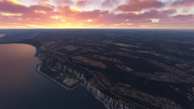 Circular aerial shot at sunset of White Cliffs of Dover. United Kingdom