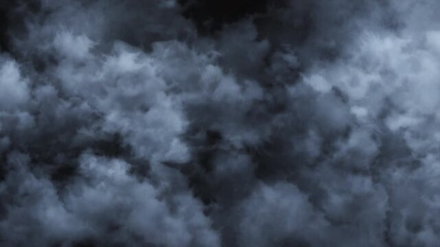 Powerful lightning bolts flashing through dark storm clouds during a dramatic thunderstorm, creating an intense atmospheric sky scene for weather and nature backgrounds