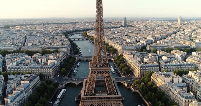 Aerial view of Eiffel Tower over Paris cityscape with Seine River
