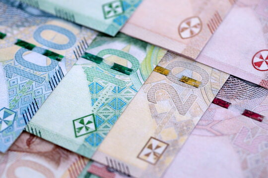 South African rand paper banknotes pile on table. South Africa ZAR currency money bills in big amount. Concept of economics, taxation and banking in South Africa