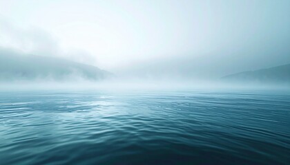 Fototapeta premium Misty Ocean Serenity - A Tranquil Seascape with Ethereal Fog.