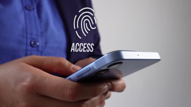 Businesswoman holding a smartphone with an animated fingerprint and the word "Access". Biometric access.