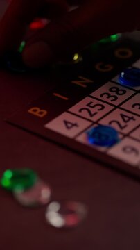 Vertical Video Bingo Game, Playing bingo with blue chips