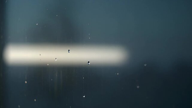 Quiet greenhouse roof background with slow daylight travel across translucent panels and faint condensation shimmer