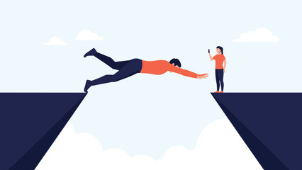 Obraz premium Man taking a leap of faith across a deep gap while a woman records the moment on her smartphone for social media.