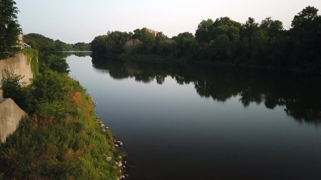 Late afternoon on Grand River as it passes calmly through Cambridge, Ontario, Canada.