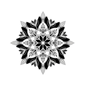 Intricate black and white floral mandala with detailed symmetrical design