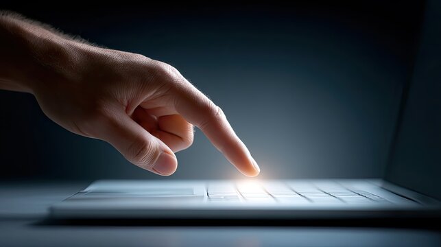 Finger touching virtual screen search bar, desktop and laptop work, minimal noir lighting, over shoulder negative space