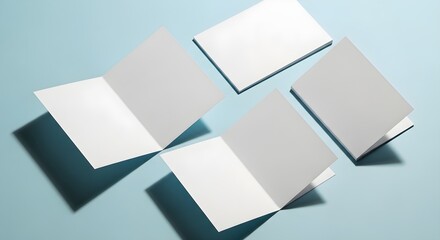 Obraz premium Blank white business cards on light blue background, empty templates for design, modern minimalistic style