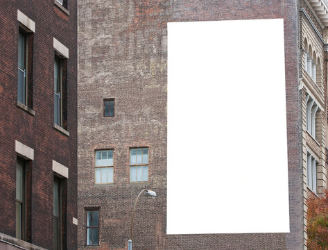 Large blank billboard on side of a Manhattan building in downtown New York