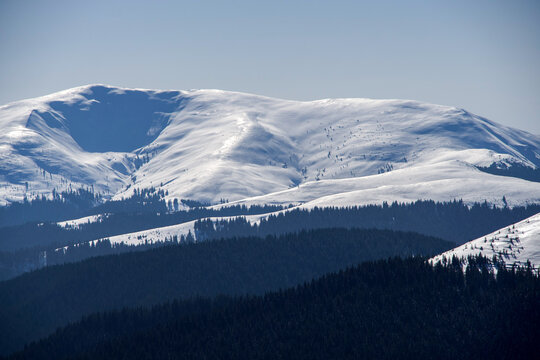 snow covered mountains, Leaota Mountains, view from Bucsa Peak, Romania