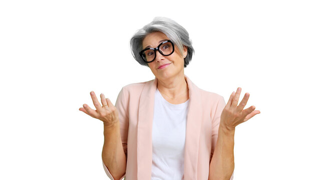 Older woman shrugging shoulders expressing doubt and uncertainty
