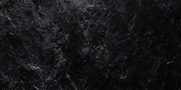 Abstract black wall texture background with rough slate surface deep shadows, highlights on jagged edges.