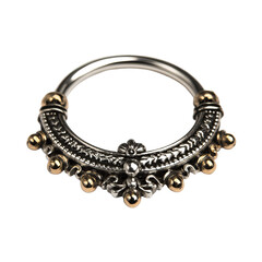 Obraz premium Ornate silver and gold nose ring, circular with detailed engravings and embellishments