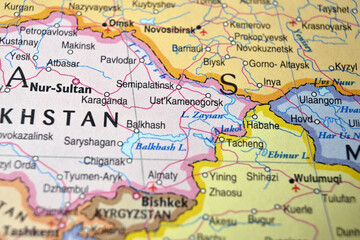 Obraz premium Defocused Map Background Highlighting Ust-Kamenogorsk Geography and Travel Concept