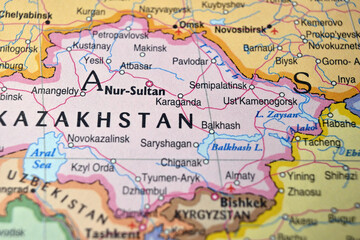 Naklejka premium Defocused Map Background Highlighting Karaganda Geography and Travel Concept