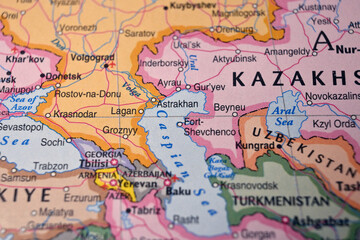 Naklejka premium Defocused World Map Background Showing Astrakhan Location Geography and Travel Concept