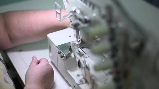 Efficient Factory Environment With Skilled Operators Managing Multiple Thread Overlock Machines. Media