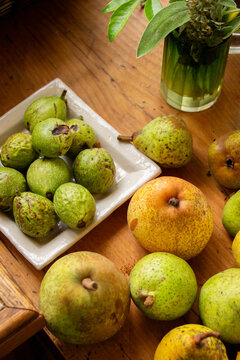 Quinces and pears on a countertable in the french country side