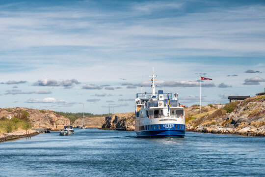 Passenger ship M/S Soten in Sotekanalen, Sote Canal, Bohusl&auml;n, west coast Sweden, sailing through narrow channel with rocky shoreline