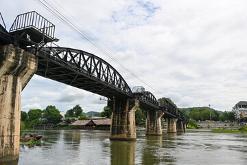 Thai landmark and destination, Death Railway Bridge line, Bridge over River, amazing arthouses on the river of Kanchanaburi, Thailand, Asia