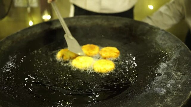 Traditional Indian Street Food: Deep-Fried Potato Tikia for Spicy Batata Chaat