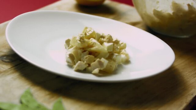Lady s Caprice salad with chicken and pineapple plated on a dish