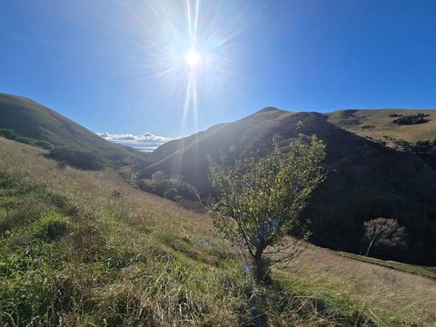 The Sun Rises over the Mountain Valley