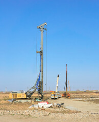 Construction site with rotary drilling rigs