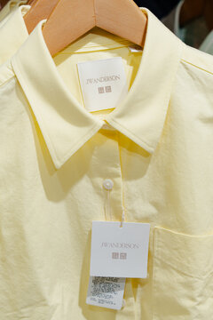 March 13, 2026, Seoul, South Korea - Close-up of a yellow Uniqlo x JW Anderson shirt with tags