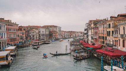 Venice Grand Canal with historic buildings and boats under a clear sky © george