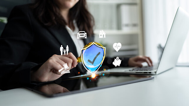 Business Professional Planning Digital Security Protection Concept with Laptop and Shield Symbolizing Trust in Finance and Insurance Industry Quark.