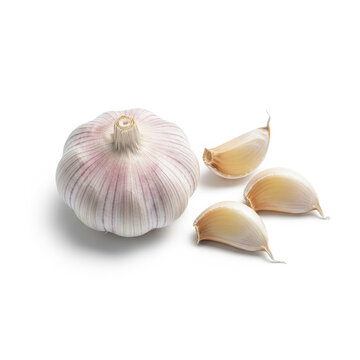 A whole garlic bulb with separated cloves on a white background
