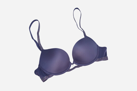 Lingerie. Blue women's push-up bra isolated on a white background. Fashionable women's underwear.