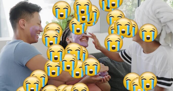 Center holding purple mask jar, two friends scooping and spreading product to pamper face