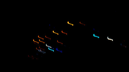 Abstract background, colored lines on black background	
