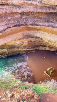 Beautiful and famous Benagil Cave seen from the top, Algarve, Portugal