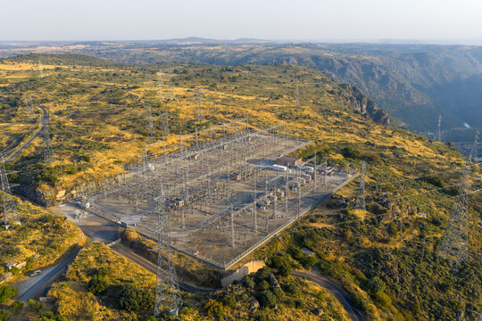 Electrical substation with power pylons and power lines at a hydroelectric power plant