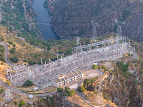 Electrical substation with power pylons and power lines at a hydroelectric power plant