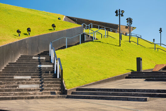 Outdoor concrete stairs leading up the green roof of the International Congress Centre, Katowice, Silesia, Poland, Europe.