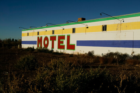 Retro motel building with large painted motel letters