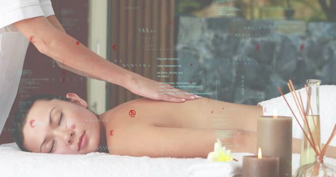 Therapist placing hand on client's upper back, sliding down in smooth strokes, promoting relaxation