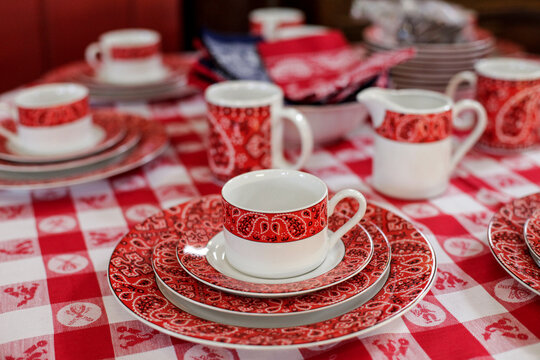 Santa Fe, New Mexico. Red patterned tea set on table traditional ceramic design