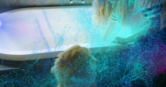 Pet dog sitting tub, woman approaching preparing bath testing water patting, blue overlay obscuring