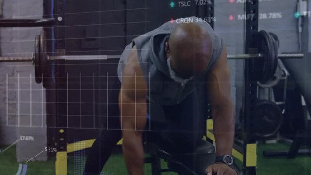 Man bracing knee on bench reaching dumbbell, performing rows with animated gym charts tracking reps